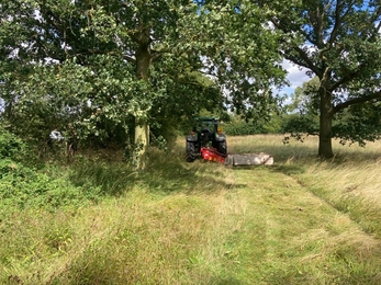 Warden Ben Calvesbert cutting hay at Mickfield Meadow 