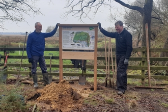 Volunteers with the new interpretation board at Snape Marshes