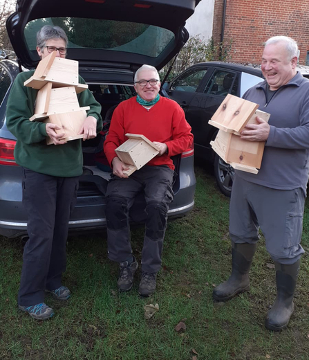 Volunteers with bat boxes – Carl Ansell 