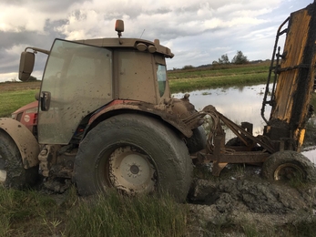 Muddy tractor at Carlton Marshes