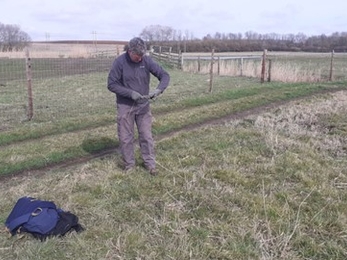 Paul clearing old wire, Trimley Marshes, Joe Underwood