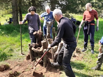 Trimley Marshes volunteers building a stag beetle pyramid - Joe Underwood 