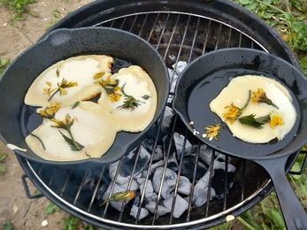 Pancakes cooked over a fire