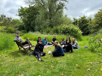 The SWT team having lunch in the office garden