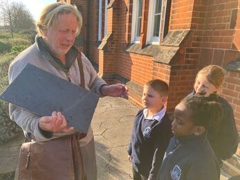 SOS Volunteer Chris delivers swift boxes to Langer Primary School