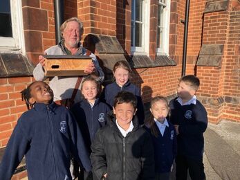 SOS Volunteer Chris delivers swift boxes to Langer Primary School
