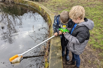 children pond dipping