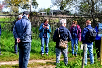 Charlie leading a walk with ANOB volunteers at Martlesham Wilds