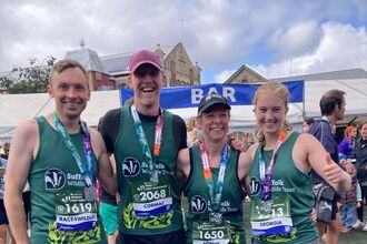 Rupert, Cormac, Sophie and Georgia smiling at the camera post run