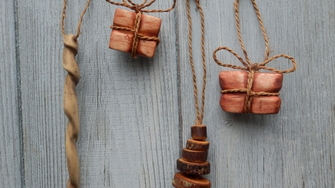 A selection of wooden Christmas decorations carved on one of Fay Jones workshops