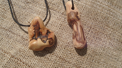 Pendants carved from wood
