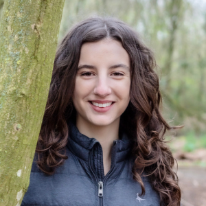 Molly, Youth board member standing by a tree image credit: Simply C photography