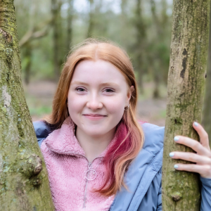 Felicity, Youth Board member, standing by a tree, Simply C Photography