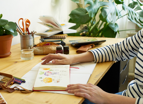 A view of a desk with sketching materials